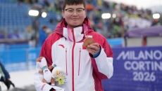 雪山之上 笑对人生——记残奥高山滑雪女子全能（站姿）季军朱文静